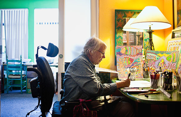“Some say my artwork is triumphing over my disability, but my disability has been helpful to me,” says Kathleen Flannigan ’62. “Instead of fighting it, I exploit it.”