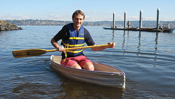 Matt Rogge paddles in 3D printed boat