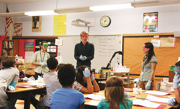 Cole Perkinson '13 leads 5th grade science lesson at Lewis Elementary
