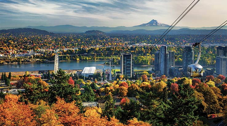 Portland's aerial tram with Mt. Hood in the distance.
