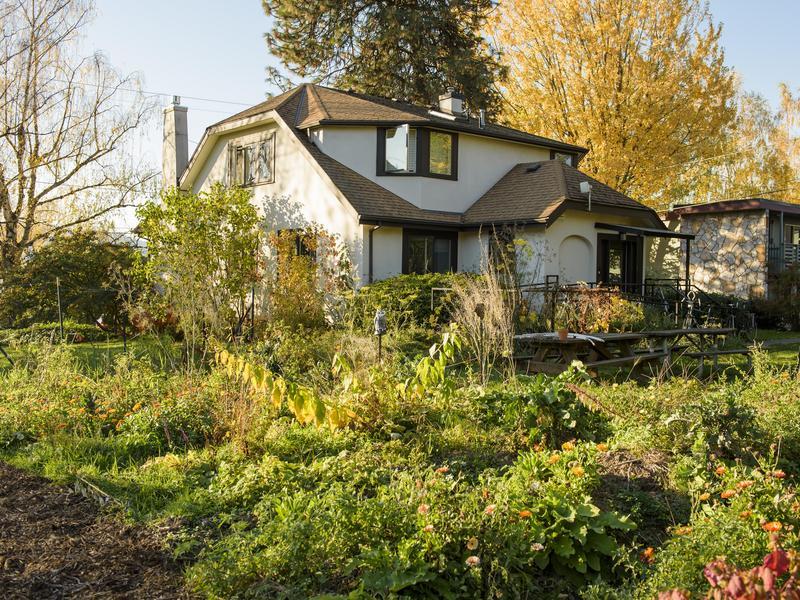 A view of the garden house and the surrounding gardens.