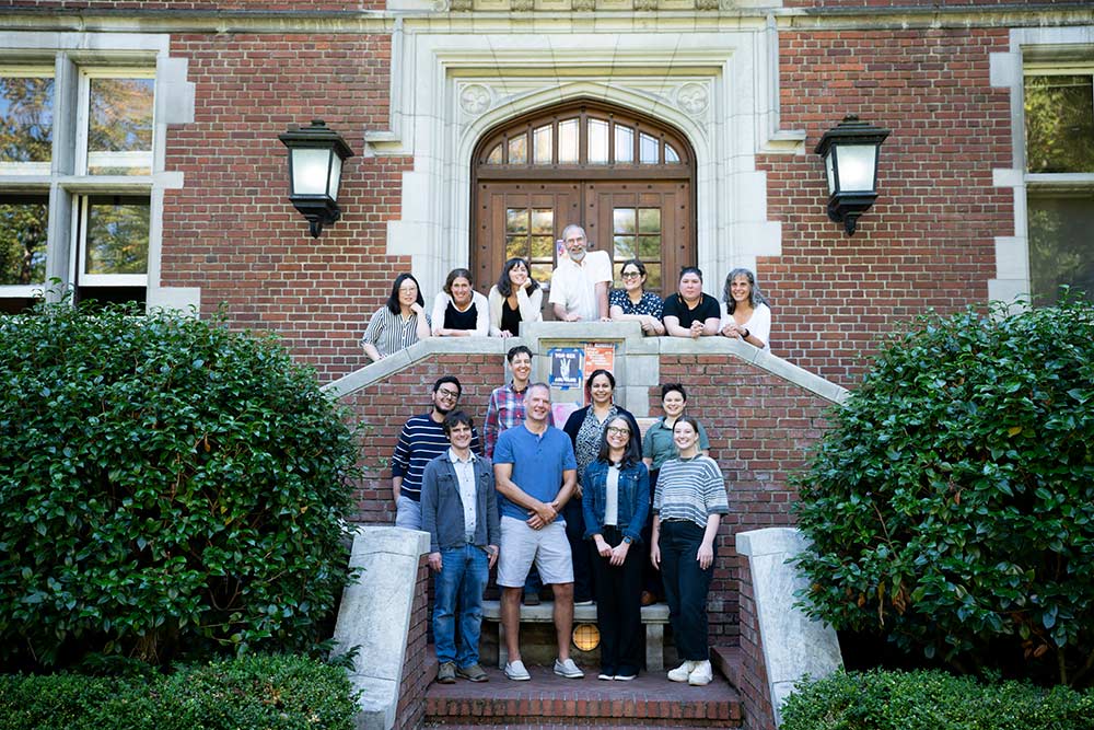 Group photo of Chemistry faculty and staff on the steps of Eliot Hall