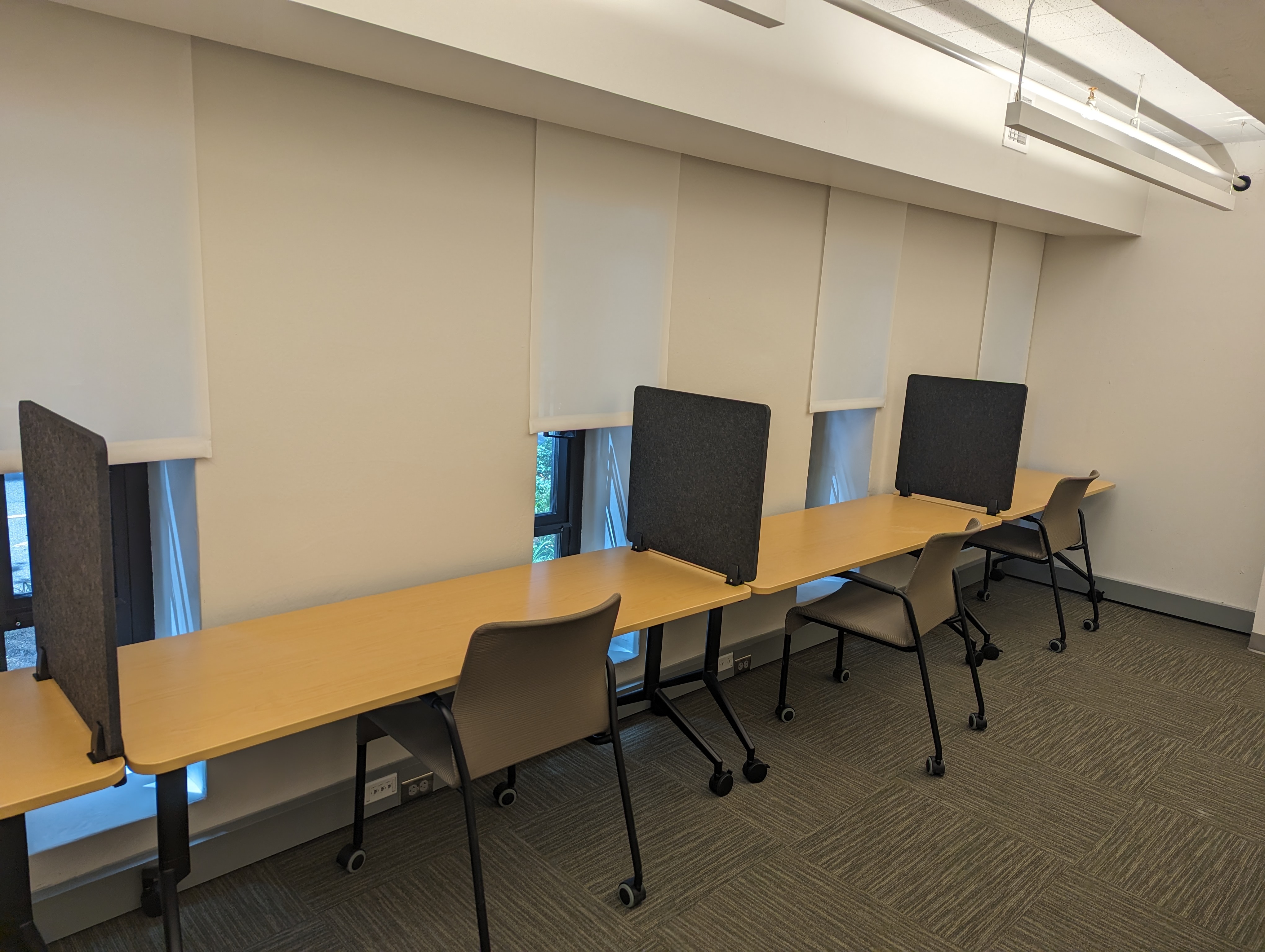 Image of three desks inside testing room