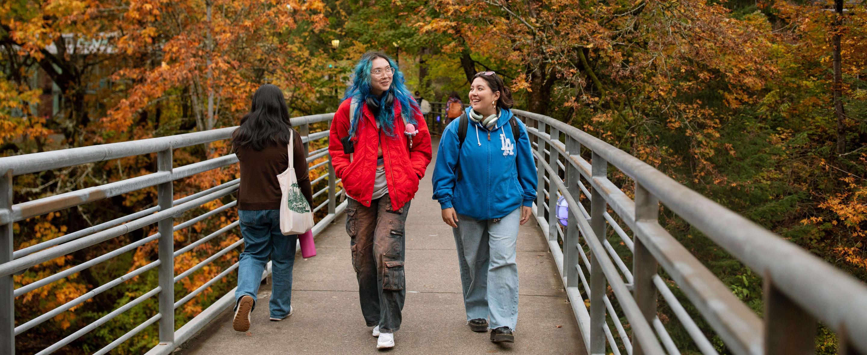 Students walk across the Blue Bridge over Reed canyon.