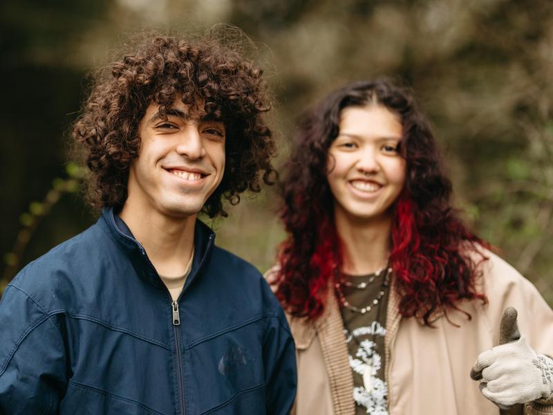 Two students in Reed canyon smiling during Canyon Day.