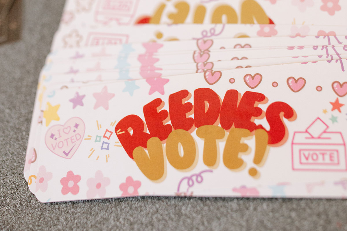 A bookmark that reads "Reedies Vote!"