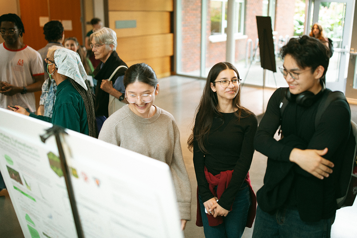 A group of students at the President's Student Showcase standing together.