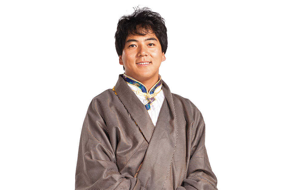 Have robe, will travel. Huatse wrote his thesis on nomadic resettlement policies in Tibet.