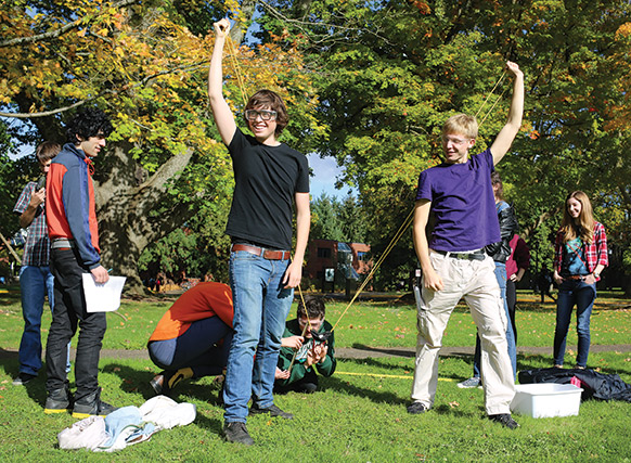 Physics 101 students investigate conservation of energy by catapulting eggs across the Great Lawn