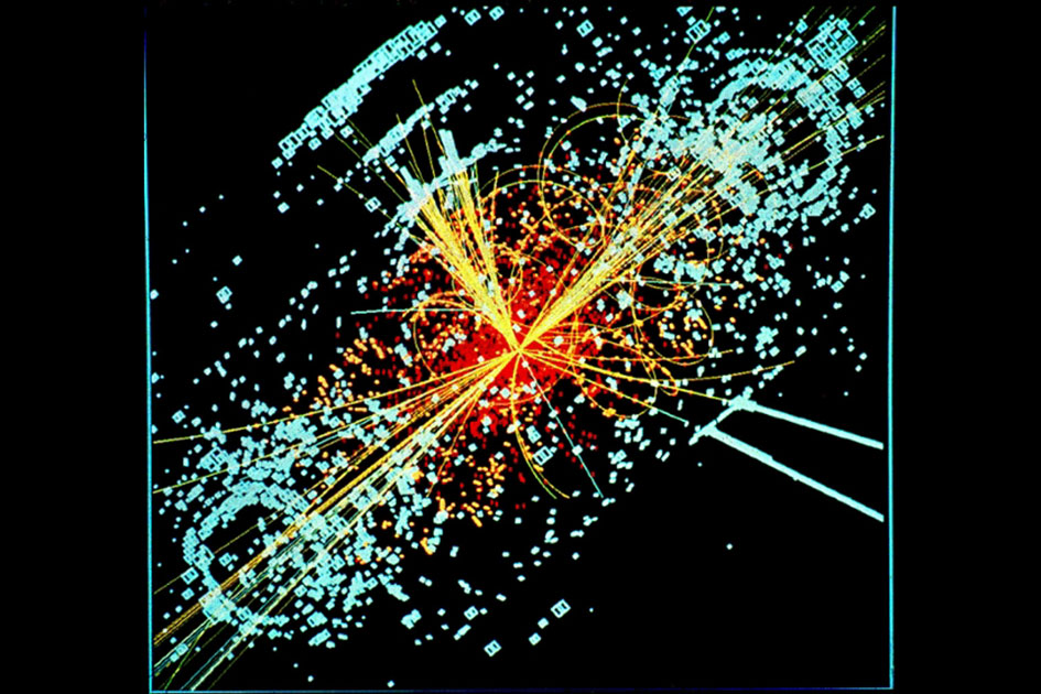 Following a collision of two protons, a Higgs boson is produced which decays into two jets of hadrons and two electrons. The lines represent the possible paths of particles produced by the proton-proton collision in the detector while the energy these particles deposit is shown in blue. [Description from CERN.]&amp;#160;
