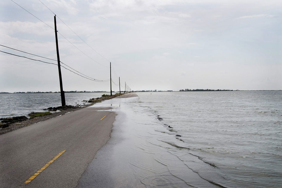 Flooding on Island Road, View toward Isle de Jean Charles from Pointe-aux-Chenes, Louisiana, 2008.