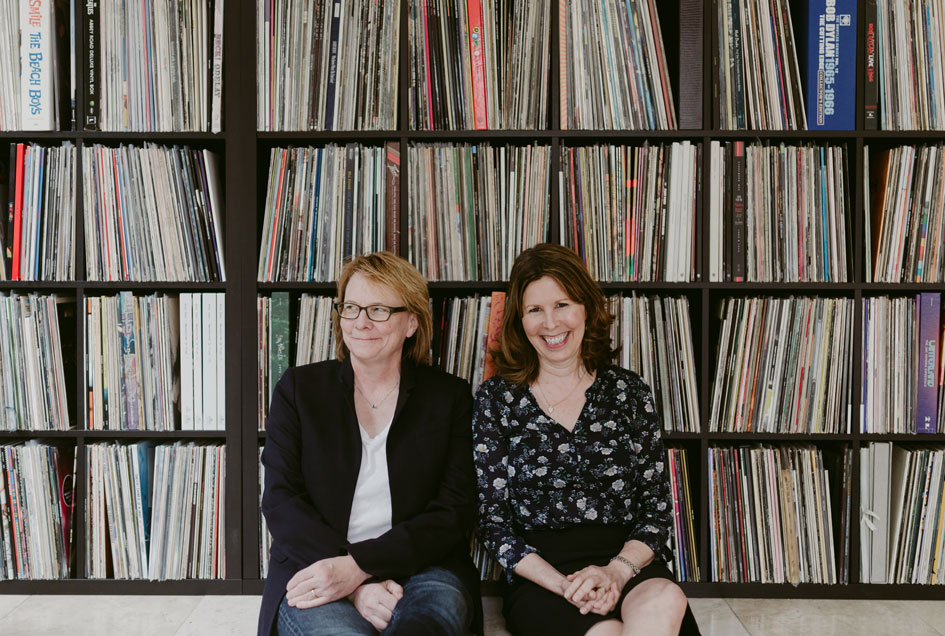Audrey Bilger and her wife, Cheryl Pawelski, at home with their record collection.