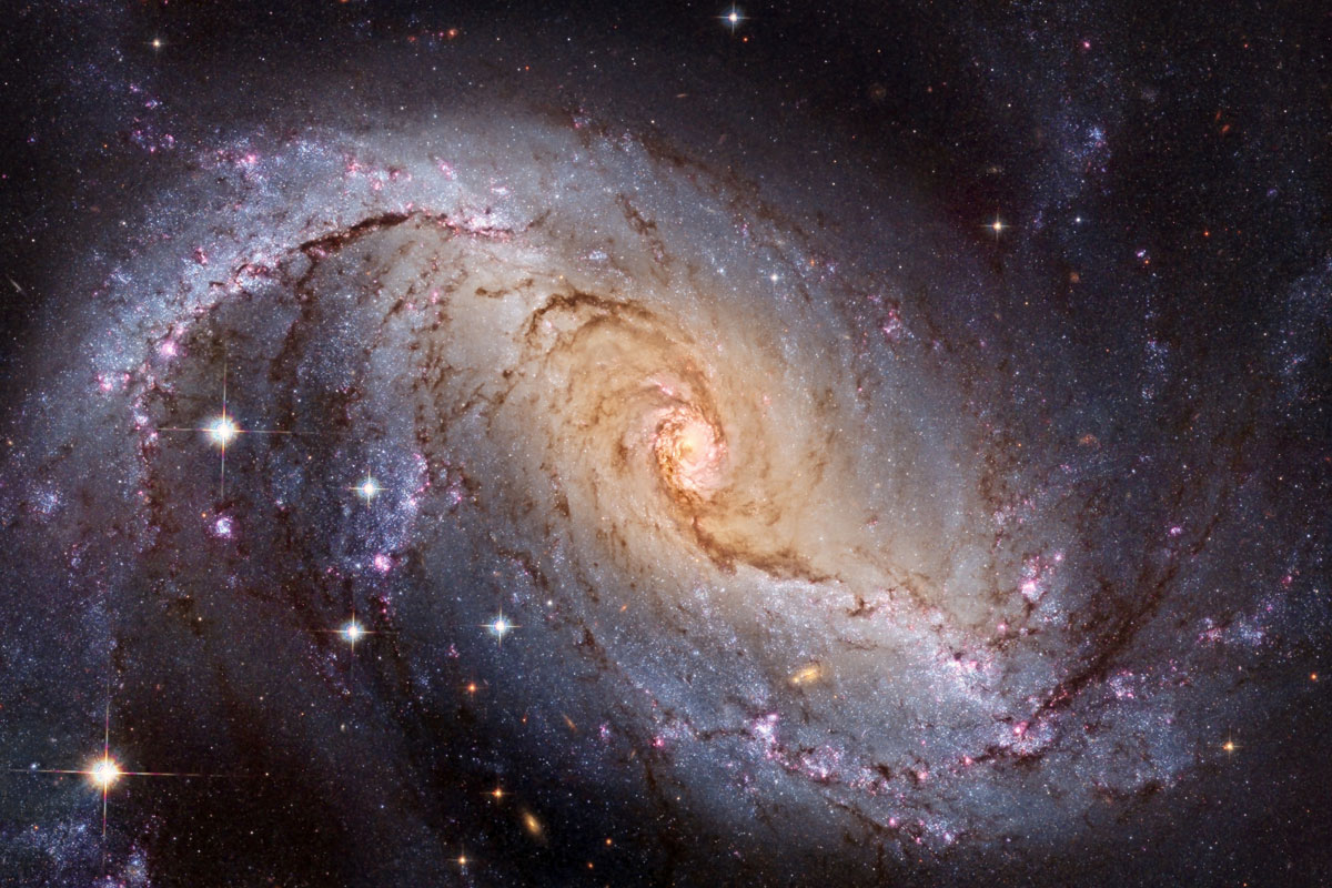 A spectacular example of a barred-spiral galaxy is NGC 1300, which lies roughly 61 million light-years away in the constellation Eridanus. (Image Credit: Hubble Legacy Archive, NASA, ESA; Processing &amp; Copyright: Domingo Pestana &amp; Raul Villaverde.)