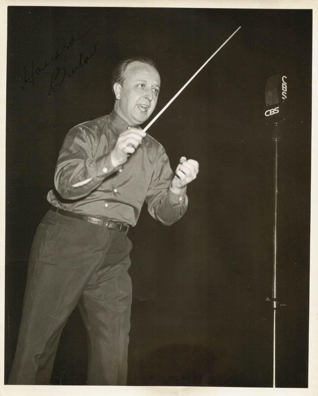 Black and white photo of Howard Barlow conducting an orchestra