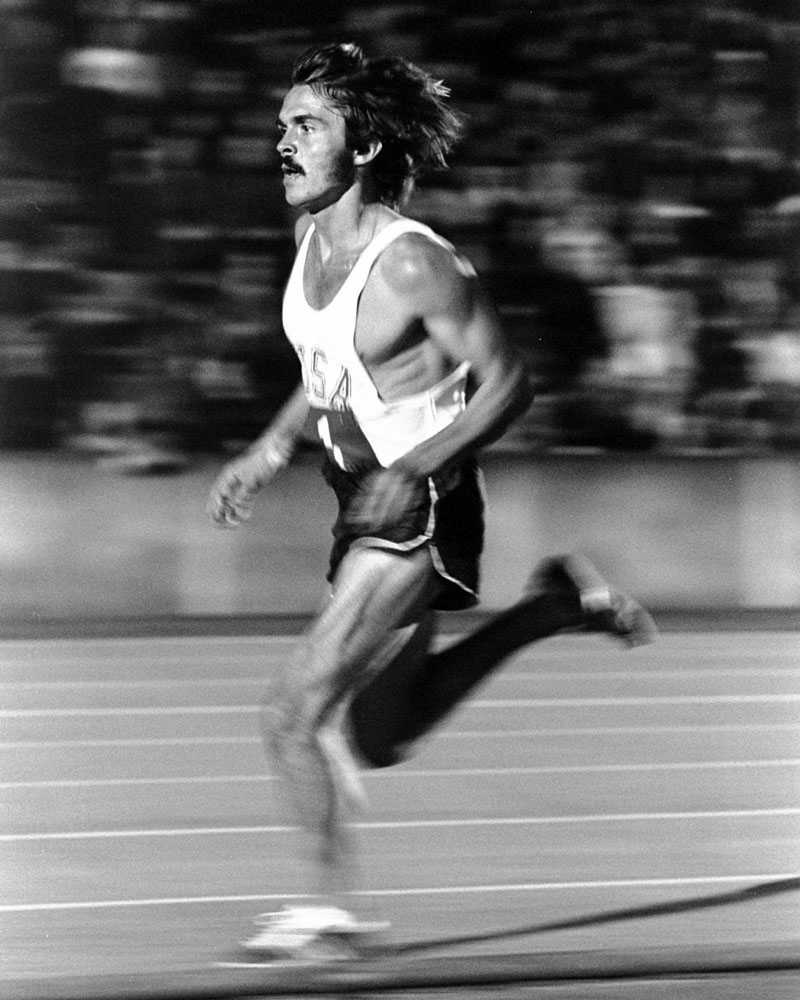 Steve Prefontaine running a race on a track