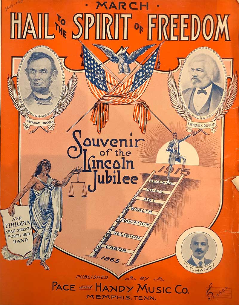 Image of a music cover sheet titled 'Hail to the Spirit of Freedom.' The top section displays Abraham Lincoln and Frederick Douglas with two crossed American Flags and a bald eagle in between them. On the bottom left there is a black woman holding a sign that says 'Ethiopia shall stretch forth her hand.' In the middle are the words 'Souvenir of the Lincoln Jubilee.' The bottom right side has a ladder that goes up to a man standing for the sunrise. The very bottom states the publisher Pace and Handy Music Co.