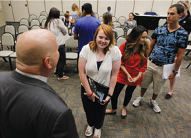 Don Asher greets students at St. Edwards University in Austin, Texas, after delivering his lectures “Choosing a Major and Career” and “Cracking the Hidden Job Market.”