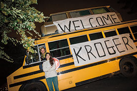 Marie Perez ’13 emblazons Kroger’s name on her double-decker bus.