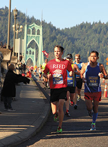 Physics major Will Holdhusen ’16 rounds the  St. Johns Bridge on the Portland Marathon.