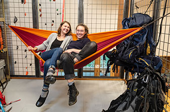 Audrey Dannar ’17 [chemistry] and backpack co-op manager Sara Kelemen ’17 [environmental studies–history] take a well-earned break in the newly remodeled sports center.