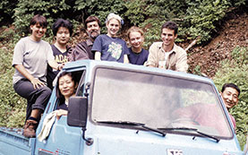 HARDY CREW. Prof. Kaplan in the field in Korea in 2002 with (left to right) Martha Baugh ’01, daughter Jessica, Lindsay Fuchs ’05, and Aaron Clark ’00. In the passenger seat is Choi Geum Sook; driving is her husband, Kim Won Ki. The couple have been doing ground support for Kaplan’s Korean fieldwork since 1985.