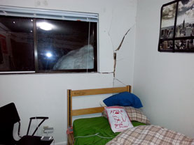 Giant snowball cracks wall in Reed dorm.
