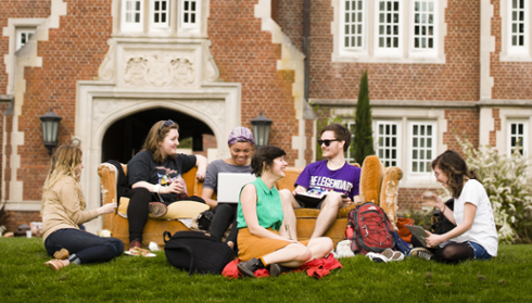 students on lawn in front of ODB