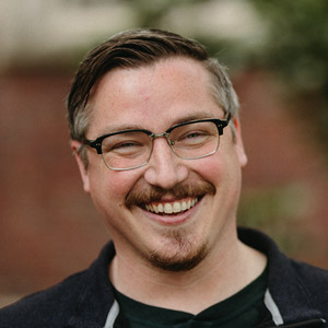 Photo portrait of Aaron Percell, graphic designer.