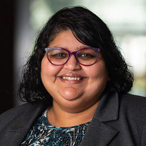 Photo portrait of Sheena McFarland, Executive Director of Strategic Communications & Marketing.