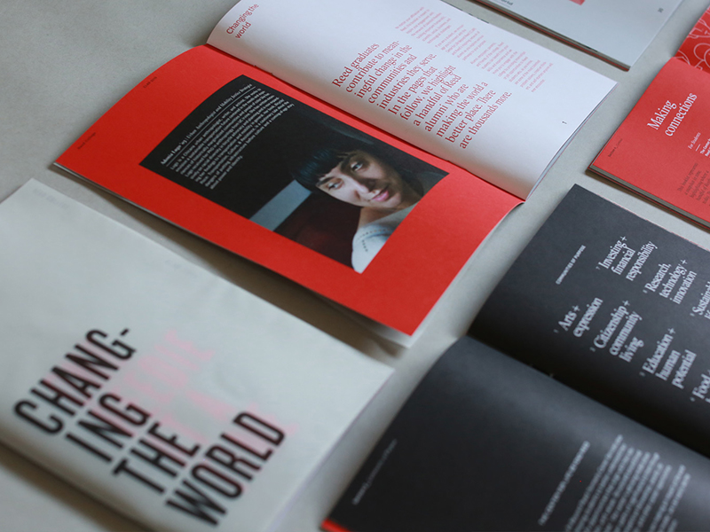 Several Reed College publications spread out on a table.